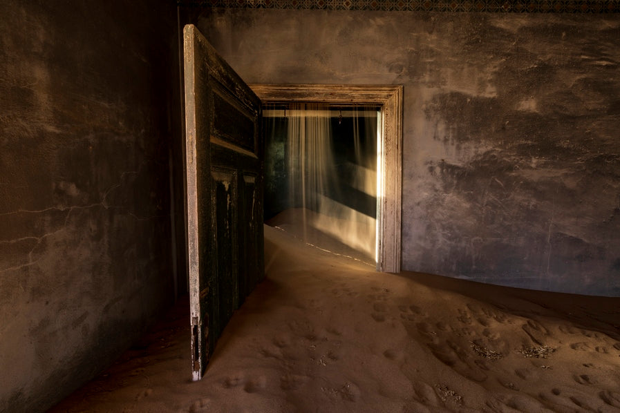 Sable dans la porte