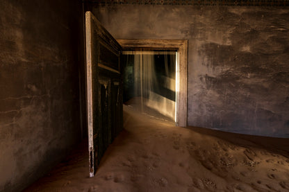 Sable dans la porte